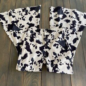 Peach Love California Cow Print Flared Bell Raw Hem Pants Womens Size S (G8)